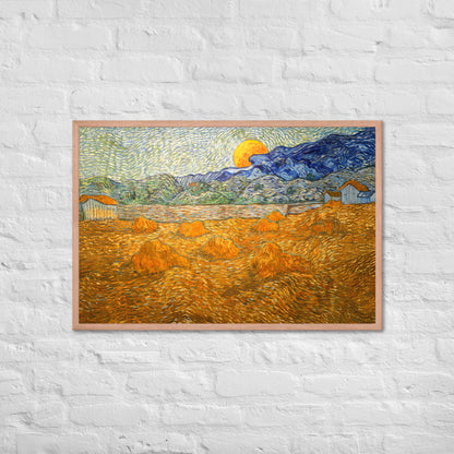 Van Gogh's 'Landscape with Wheat Sheaves and Rising Moon' on a 24"x36" red oak framed poster print on a white brick wall.