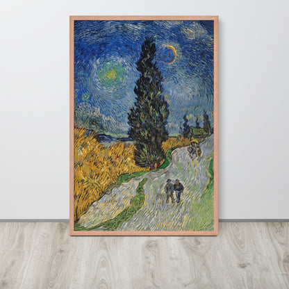 Van Gogh's 'Road with Cypress and Star' on a 24"x36" red oak framed poster print sitting on a wooden floor leaning against a light gray wall.
