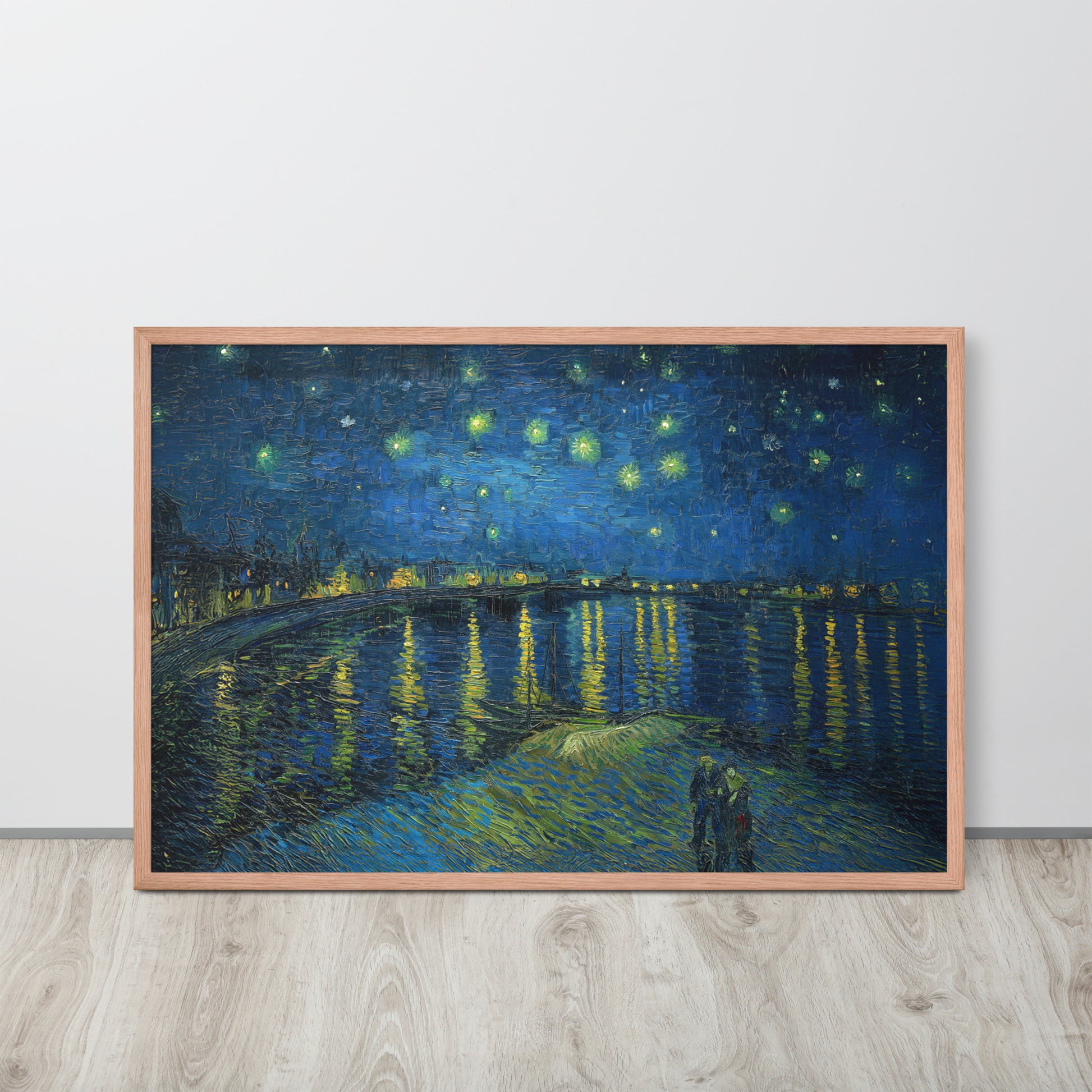Van Gogh's 'Starry Night Over the Rhone' on a 24"x36" red oak framed poster print sitting on a wooden floor leaning against a light gray wall.