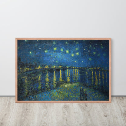 Van Gogh's 'Starry Night Over the Rhone' on a 24"x36" red oak framed poster print sitting on a wooden floor leaning against a light gray wall.