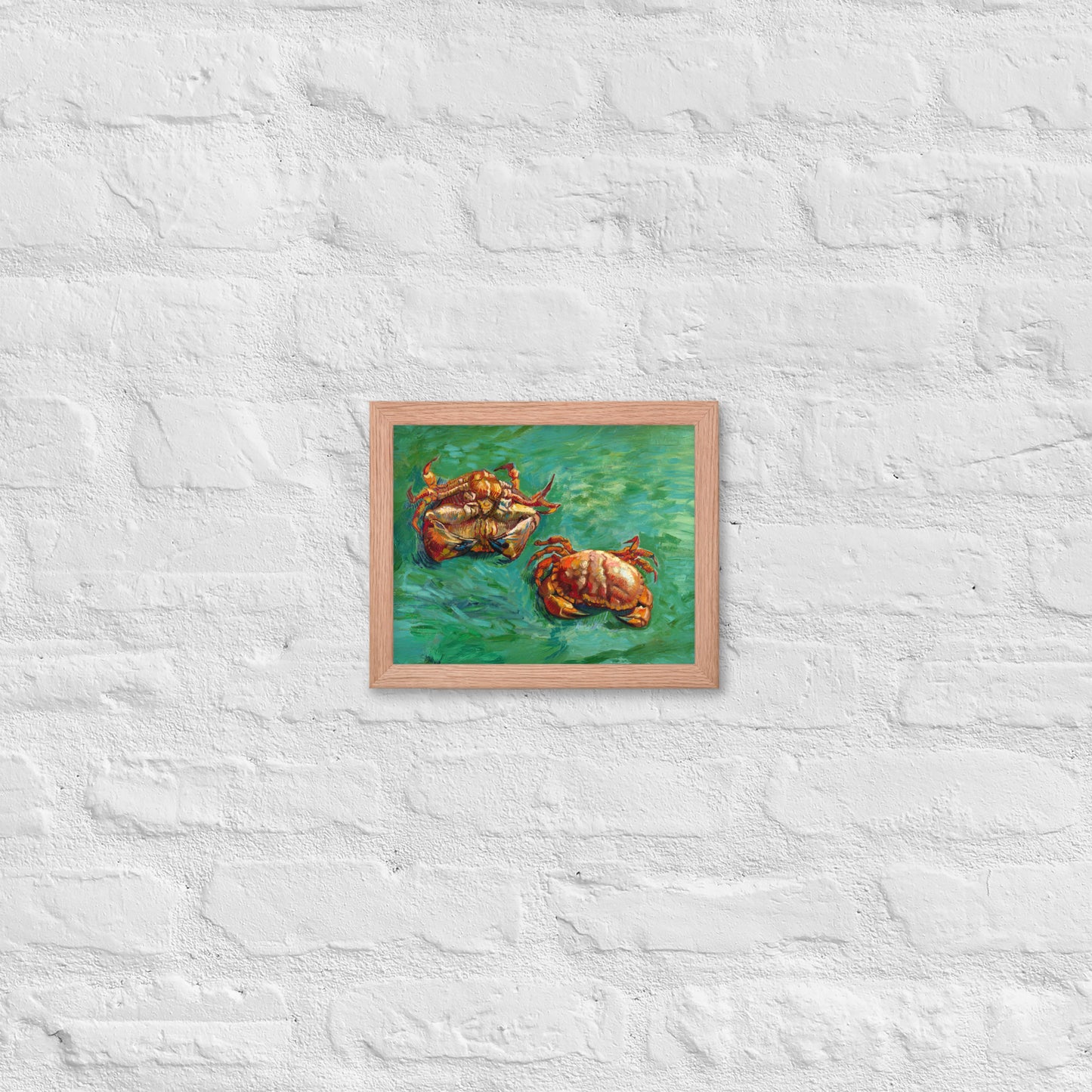 Van Gogh's 'Two Crabs' on a 8"x10" red oak framed poster print on a white brick wall.