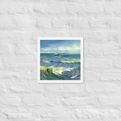 Van Gogh's 'The Sea at Les Saintes-Maries-de-la-Mer' on a 12"x12" white framed poster print on a white brick wall.