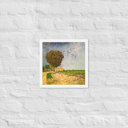 Van Gogh's 'A Lane near Arles' on a 12"x12" white framed poster print on a white brick wall.