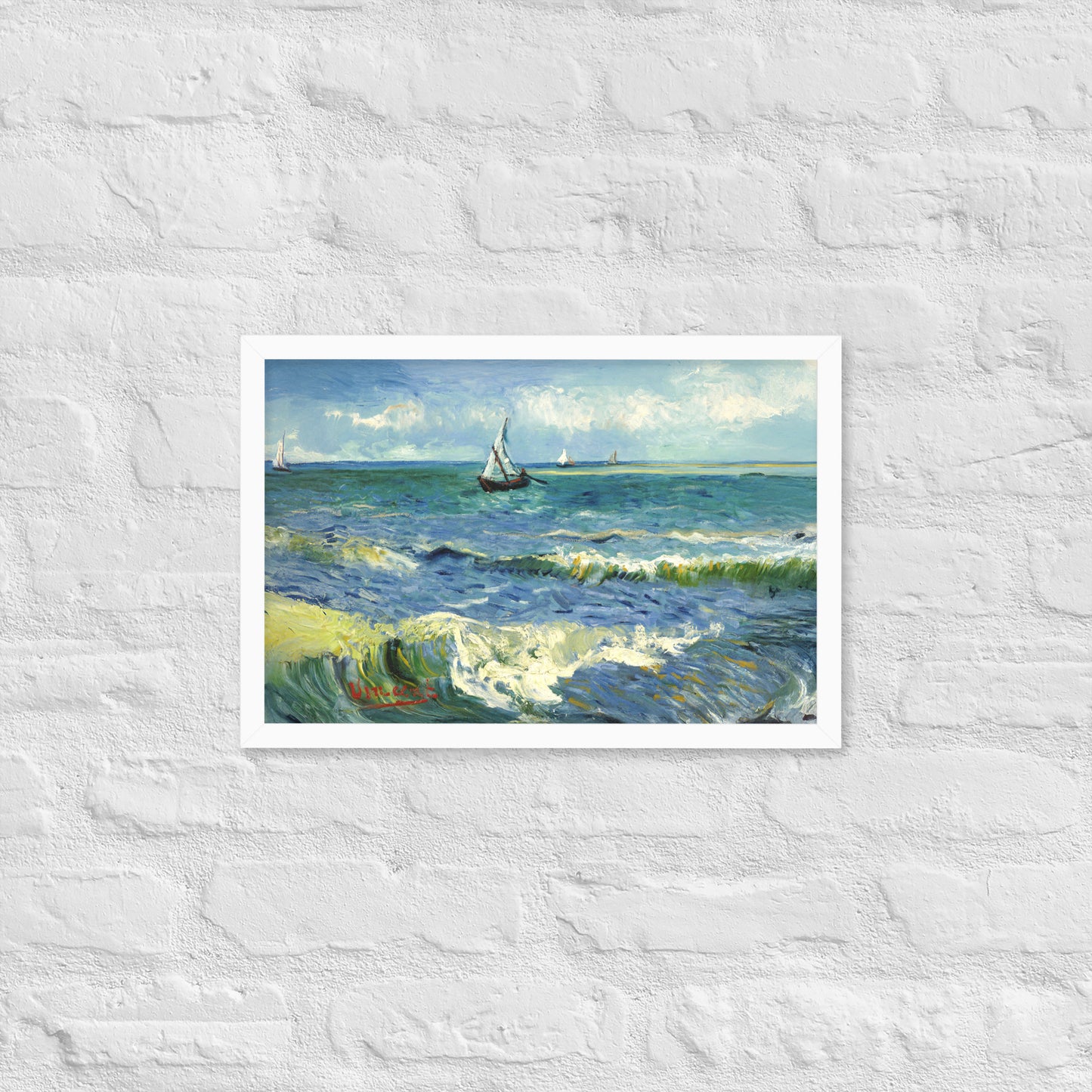 Van Gogh's 'The Sea at Les Saintes-Maries-de-la-Mer' on a 12"x18" white framed poster print on a white brick wall.