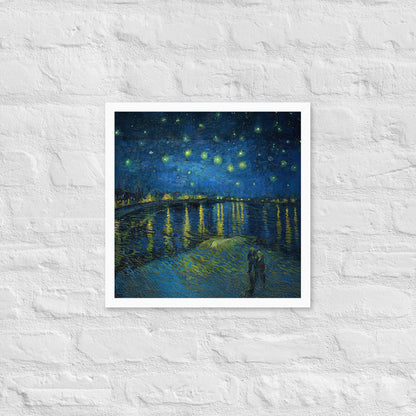 Van Gogh's 'Starry Night Over the Rhone' on a 16"x16" white framed poster print on a white brick wall.
