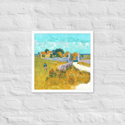 Van Gogh's 'Farmhouse in Provence' on a 16"x16" white framed poster print on a white brick wall.