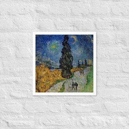 Van Gogh's 'Road with Cypress and Star' on a 16"x16" white framed poster print on a white brick wall.