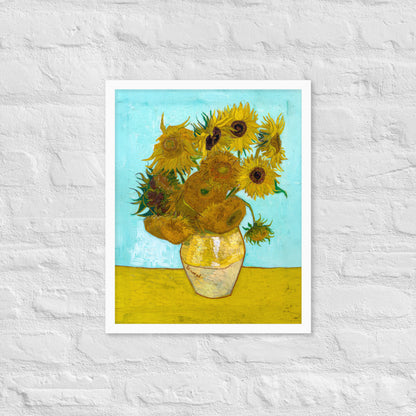 Van Gogh's 'Vase with Twelve Sunflowers' on a 16"x20" white framed poster print on a white brick wall.