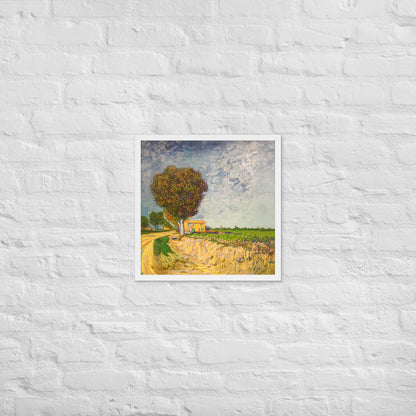 Van Gogh's 'A Lane near Arles' on a 18"x18" white framed poster print on a white brick wall.