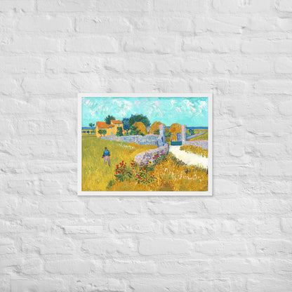 Van Gogh's 'Farmhouse in Provence' on a 18"x24" white framed poster print on a white brick wall.
