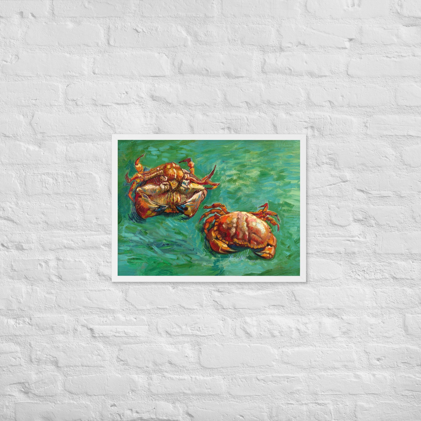 Van Gogh's 'Two Crabs' on a 18"x24" white framed poster print on a white brick wall.