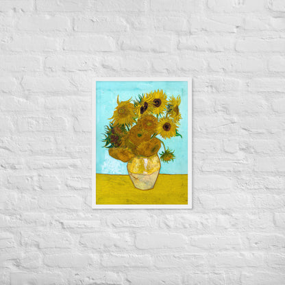 Van Gogh's 'Vase with Twelve Sunflowers' on a 18"x24" white framed poster print on a white brick wall.