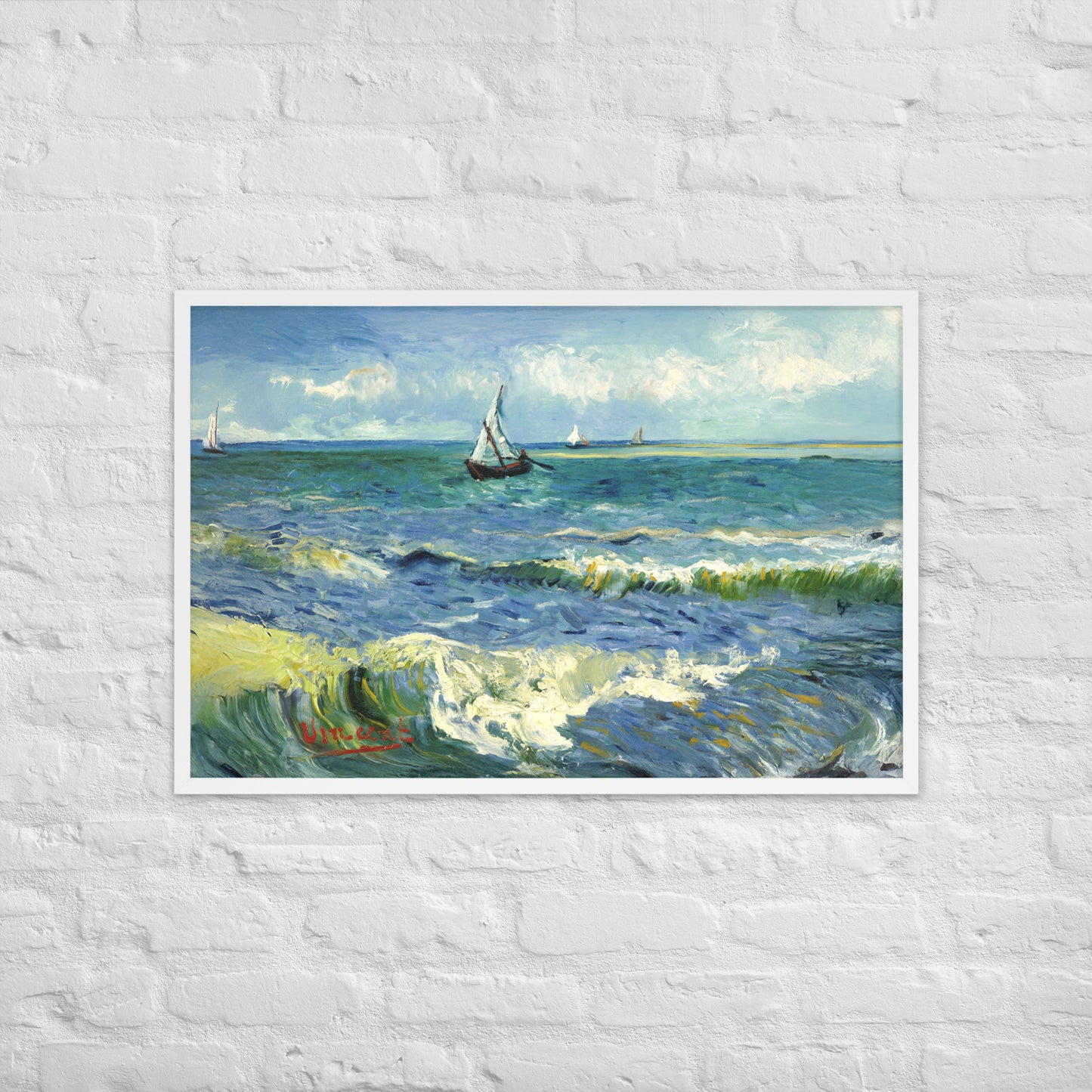Van Gogh's 'The Sea at Les Saintes-Maries-de-la-Mer' on a 24"x36" white framed poster print on a white brick wall.