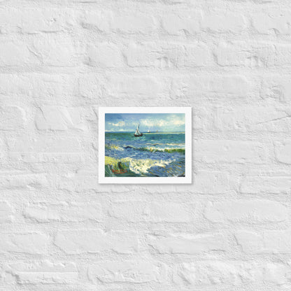 Van Gogh's 'The Sea at Les Saintes-Maries-de-la-Mer' on a 8"x10" white framed poster print on a white brick wall.