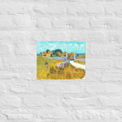 Van Gogh's 'Farmhouse in Provence' on a 11"x14" unframed poster print on a white brick wall.