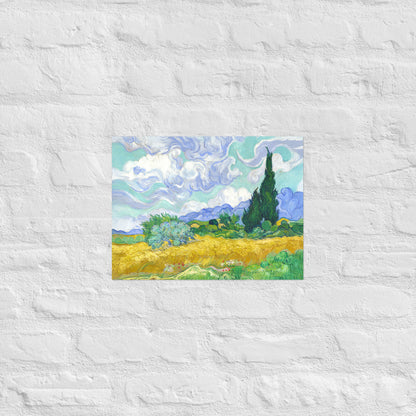 Van Gogh's 'Wheat Field with Cypresses' on a 12"x16" unframed poster print on a white brick wall.