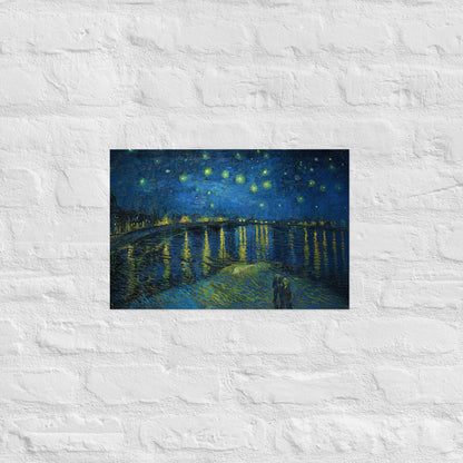 Van Gogh's 'Starry Night Over the Rhone' on a 12"x18" unframed poster print on a white brick wall.