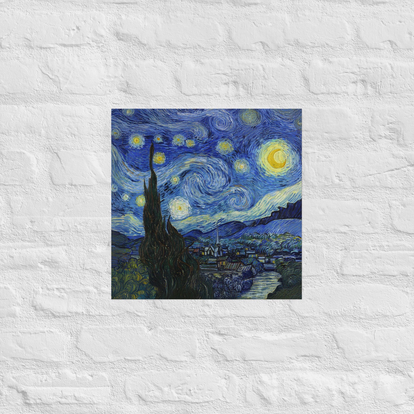 Van Gogh's 'Starry Night' on a 16"x16" unframed poster print on a white brick wall.