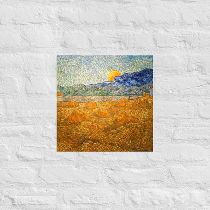 Van Gogh's 'Landscape with Wheat Sheaves and Rising Moon' on a 16"x16" unframed poster print on a white brick wall.