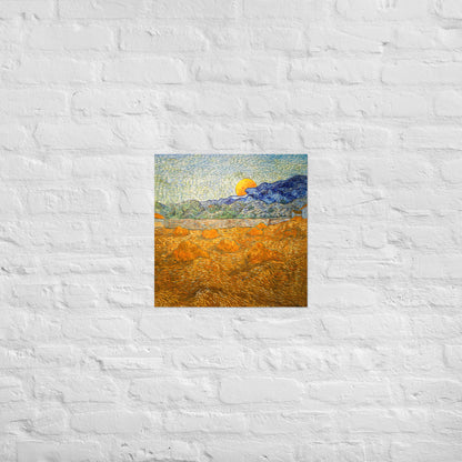 Van Gogh's 'Landscape with Wheat Sheaves and Rising Moon' on a 18"x18" unframed poster print on a white brick wall.
