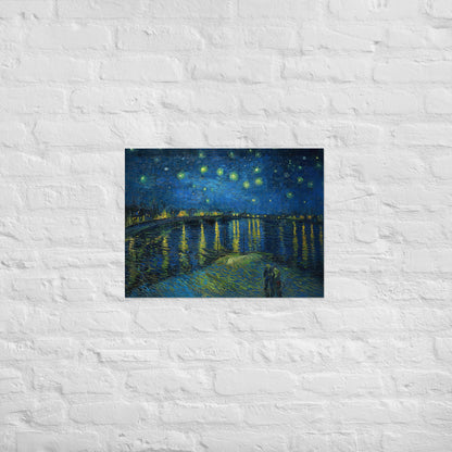 Van Gogh's 'Starry Night Over the Rhone' on a 18"x24" unframed poster print on a white brick wall.