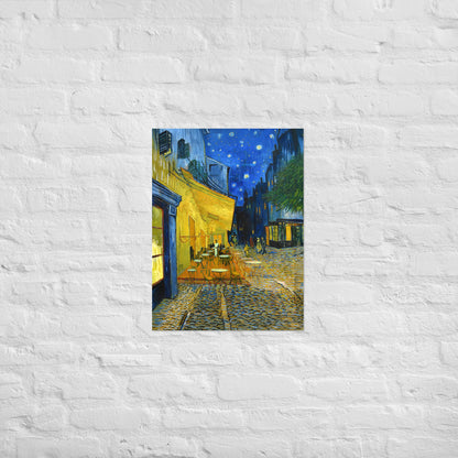 Van Gogh's 'Café Terrace at Night' on a 18"x24" unframed poster print on a white brick wall.