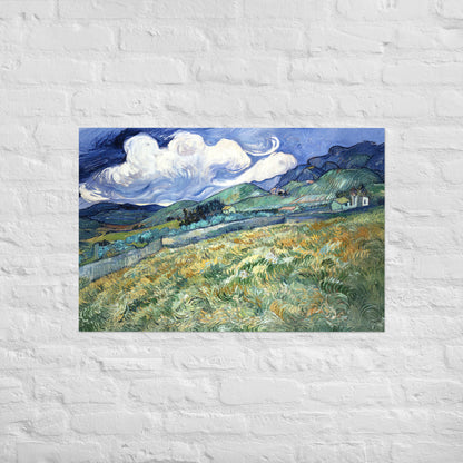 Van Gogh's 'Landscape from Saint-Rémy' on a 24"x36" unframed poster print on a white brick wall.