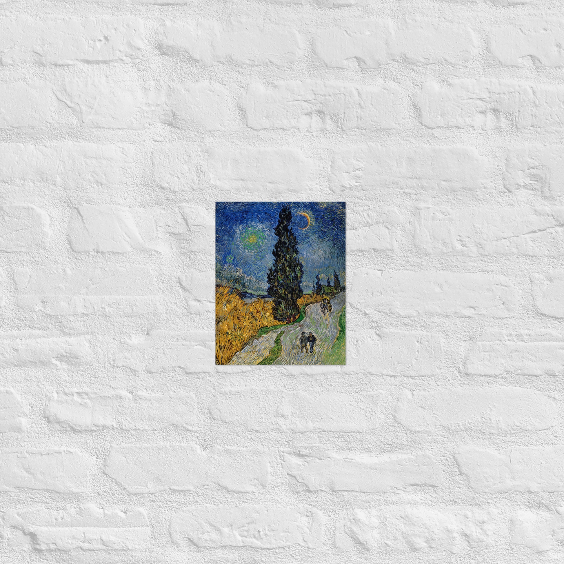 Van Gogh's 'Road with Cypress and Star' on a 8"x10" unframed poster print on a white brick wall.