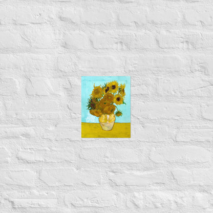 Van Gogh's 'Vase with Twelve Sunflowers' on a 8"x10" unframed poster print on a white brick wall.