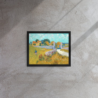 Van Gogh's 'Farmhouse in Provence' on a 11"x14" black framed canvas print on a textured gray wall.