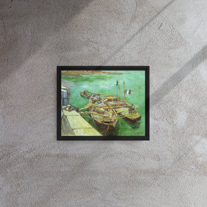Van Gogh's 'Quay with Men Unloading Sand Barges' on a 11"x14" black framed canvas print on a textured gray wall.
