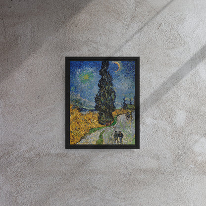 Van Gogh's 'Road with Cypress and Star' on a 11"x14" black framed canvas print on a textured gray wall.