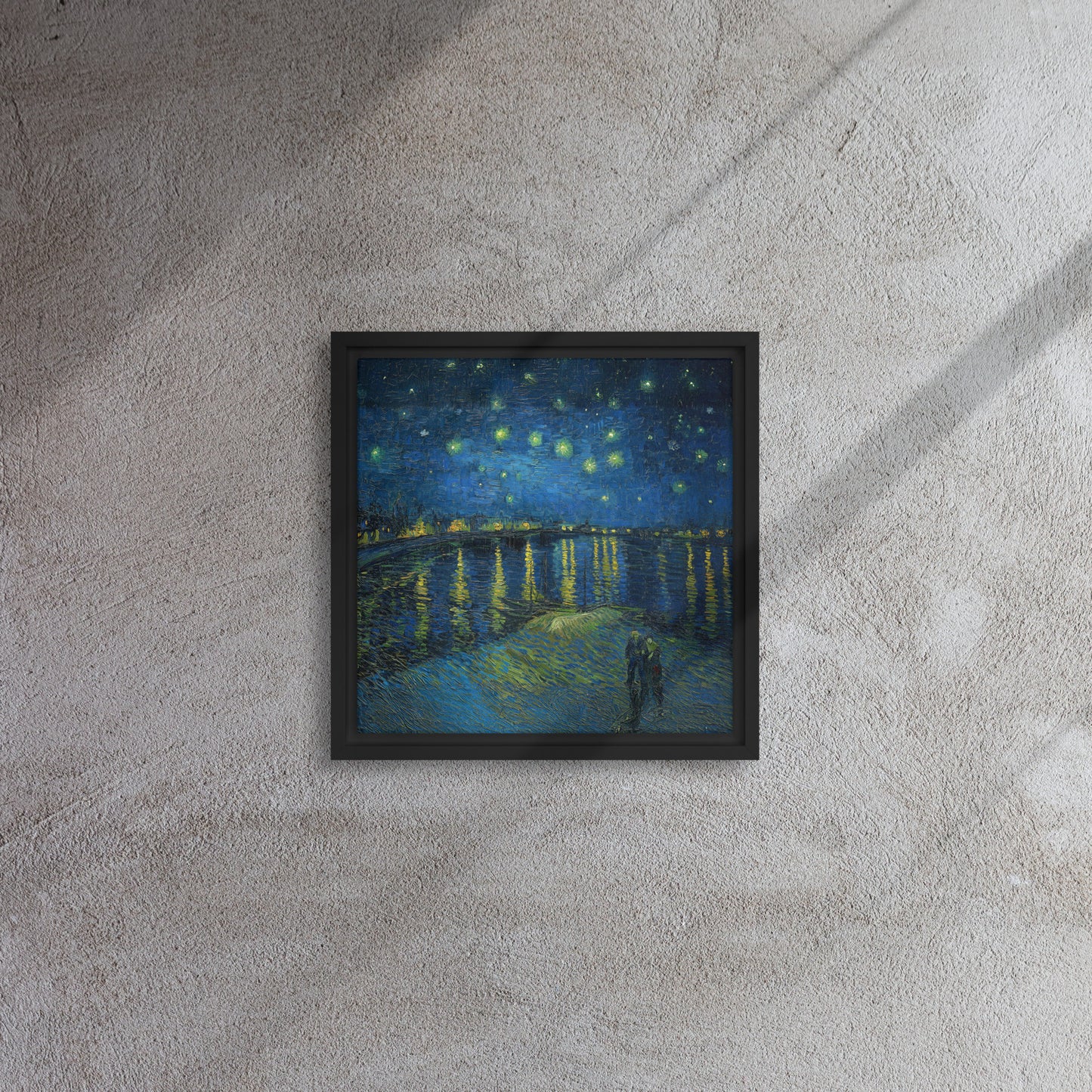 Van Gogh's 'Starry Night Over the Rhone' on a 12"x12" black framed canvas print on a textured gray wall.