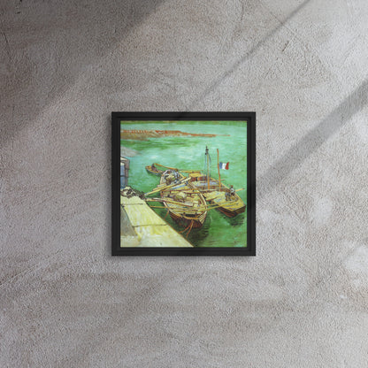 Van Gogh's 'Quay with Men Unloading Sand Barges' on a 12"x12" black framed canvas print on a textured gray wall.