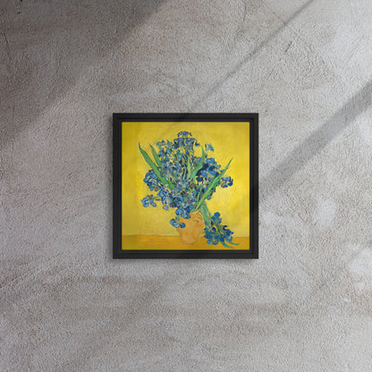 Van Gogh's 'Vase with Irises Against a Yellow Background' on a 12"x12" black framed canvas print on a textured gray wall.