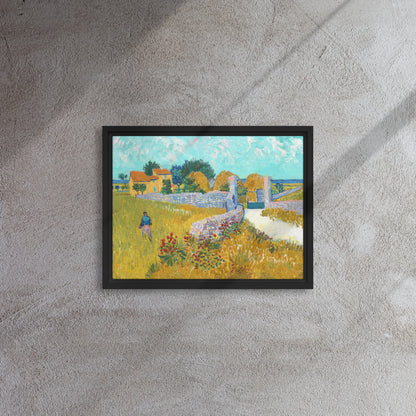 Van Gogh's 'Farmhouse in Provence' on a 12"x16" black framed canvas print on a textured gray wall.