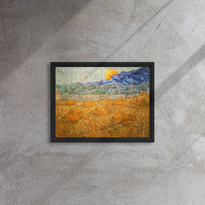 Van Gogh's 'Landscape with Wheat Sheaves and Rising Moon' on a 12"x16" black framed canvas print on a textured gray wall.