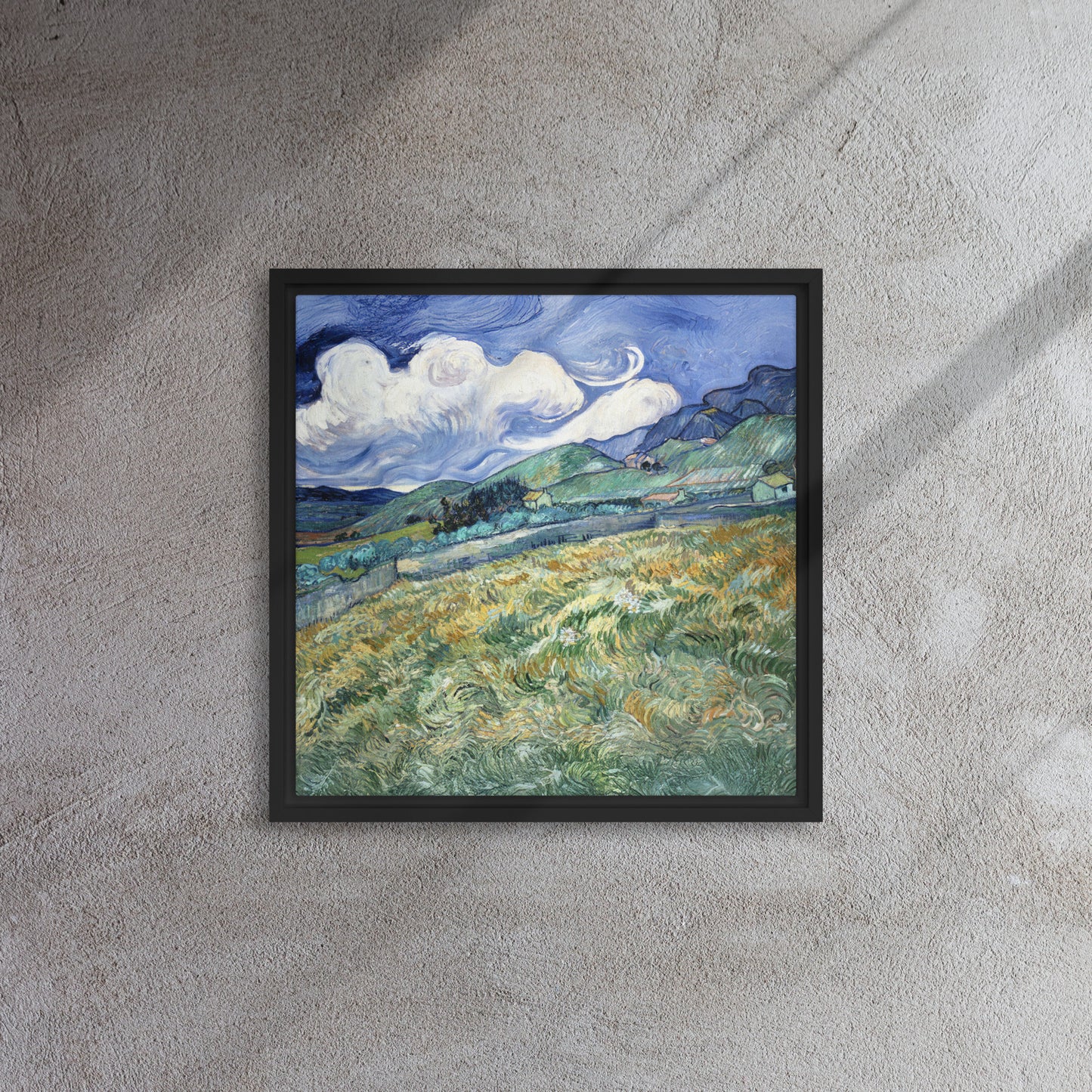 Van Gogh's 'Landscape from Saint-Rémy' on a 16"x16" black framed canvas print on a textured gray wall.