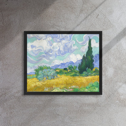 Van Gogh's 'Wheat Field with Cypresses' on a 16"x20" black framed canvas print on a textured gray wall.