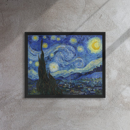 Van Gogh's 'Starry Night' on a 16"x20" black framed canvas print on a textured gray wall.