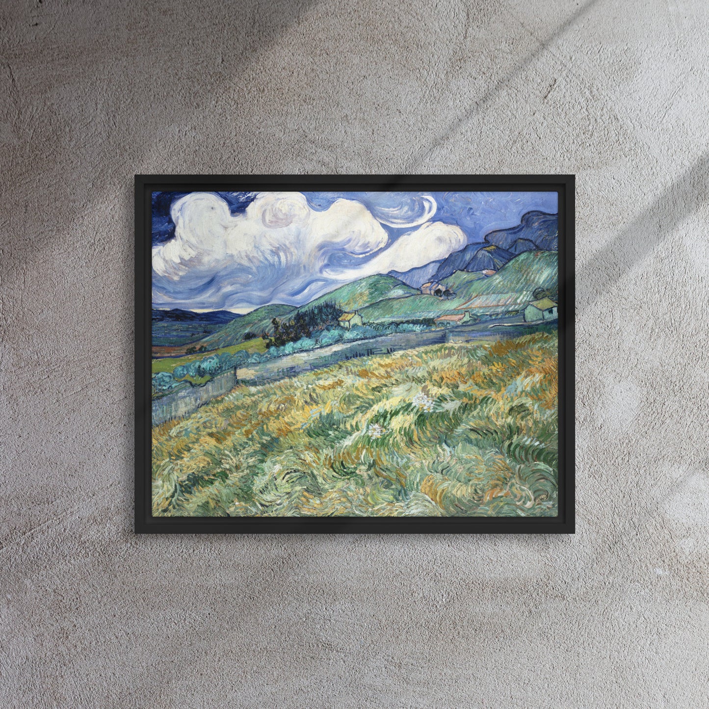 Van Gogh's 'Landscape from Saint-Rémy' on a 16"x20" black framed canvas print on a textured gray wall.