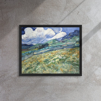 Van Gogh's 'Landscape from Saint-Rémy' on a 16"x20" black framed canvas print on a textured gray wall.