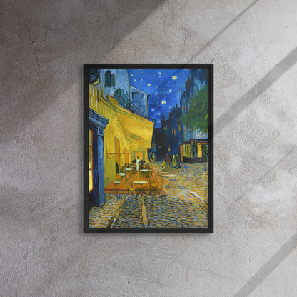 Van Gogh's 'Café Terrace at Night' on a 18"x24" black framed canvas print on a textured gray wall.