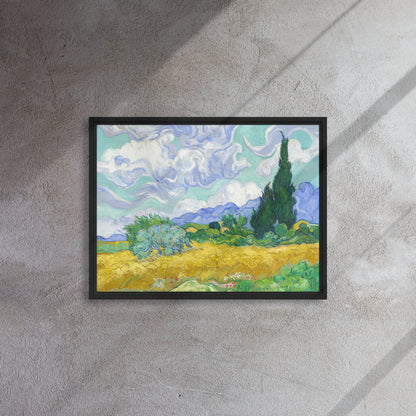 Van Gogh's 'Wheat Field with Cypresses' on a 18"x24" black framed canvas print on a textured gray wall.