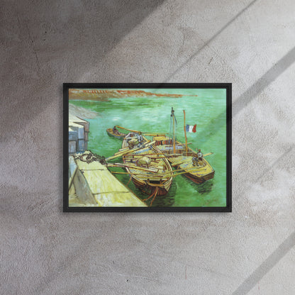 Van Gogh's 'Quay with Men Unloading Sand Barges' on a 18"x24" black framed canvas print on a textured gray wall.