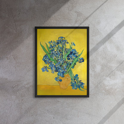 Van Gogh's 'Vase with Irises Against a Yellow Background' on a 18"x24" black framed canvas print on a textured gray wall.