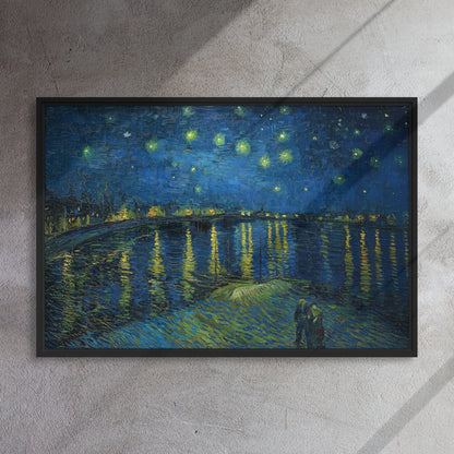 Van Gogh's 'Starry Night Over the Rhone' on a 24"x36" black framed canvas print on a textured gray wall.