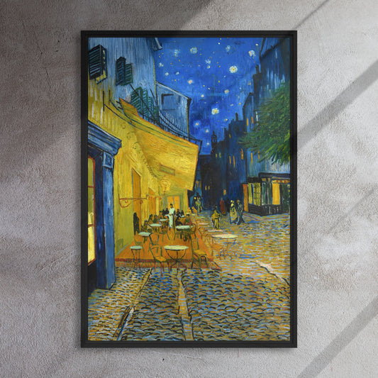 Van Gogh's 'Café Terrace at Night' on a 24"x36" black framed canvas print on a textured gray wall.