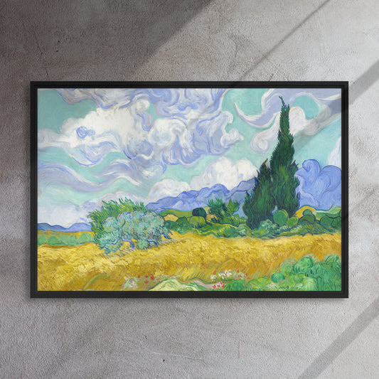 Van Gogh's 'Wheat Field with Cypresses' on a 24"x36" black framed canvas print on a textured gray wall.