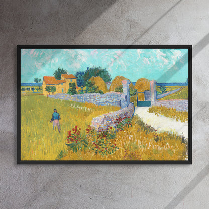 Van Gogh's 'Farmhouse in Provence' on a 24"x36" black framed canvas print on a textured gray wall.